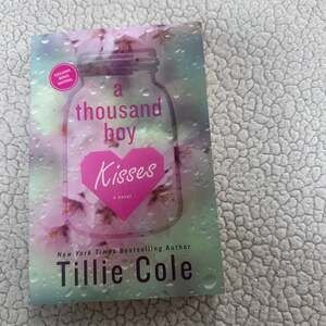 A Thousand Boy Kisses by Tillie Cole - Paperback Novel, Bonus Material Edition
